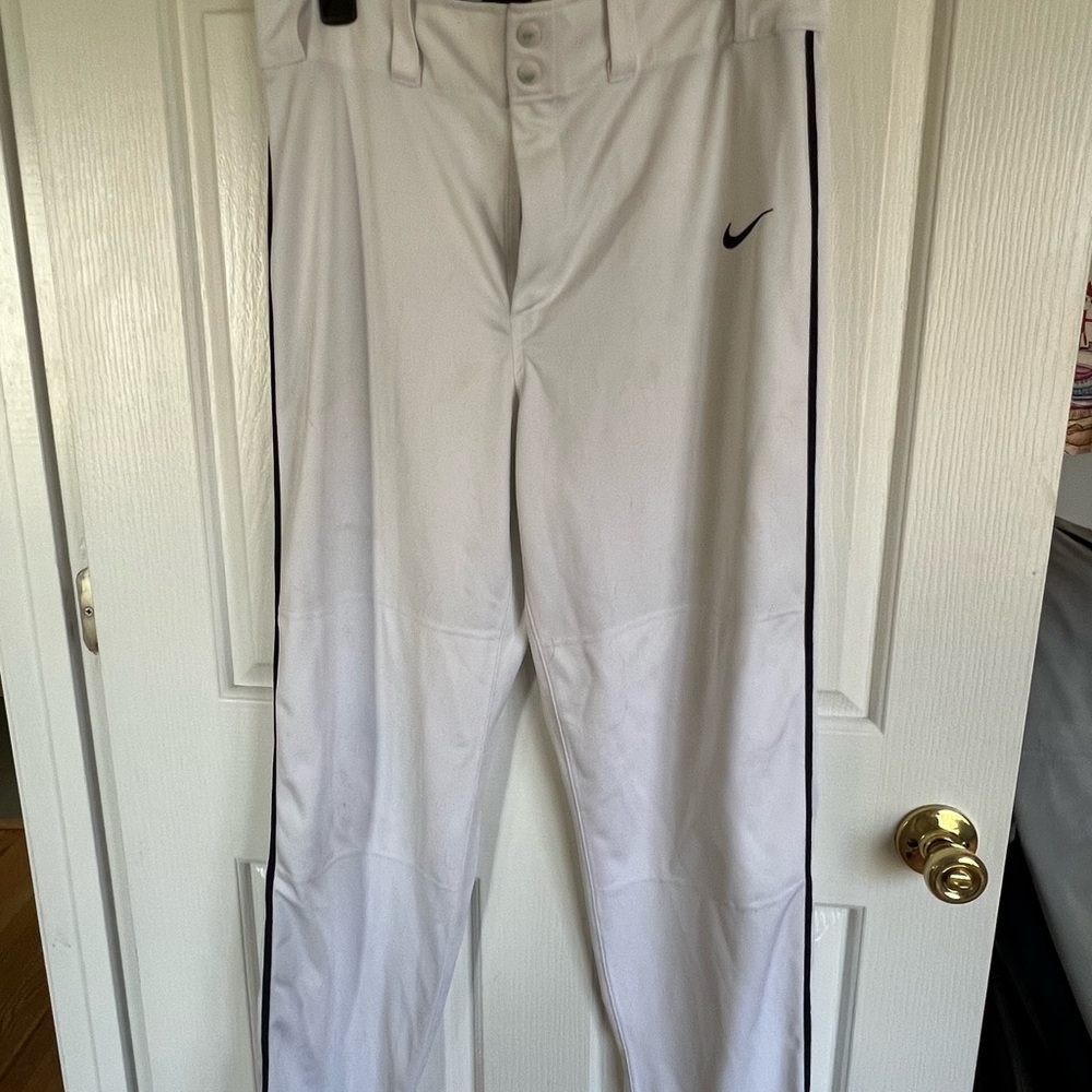 Nike men’s white baseball pants with navy trim